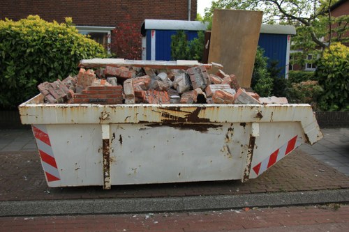 Property clearance team working in a residential area of Norwood Green