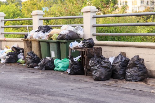 Professionals conducting property clearance in Swiss Cottage