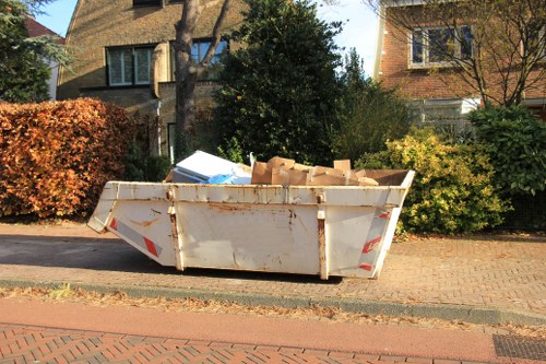 Estate clearance services being performed in a Charlton home